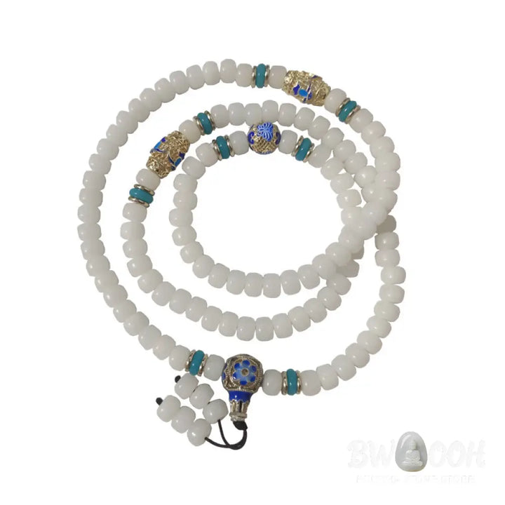 A BWOOOH Natural White Bodhi Seed Mala bracelet, featuring 108 dark-speckled beads, handmade for meditation, spiritual wisdom, and attracting wealth. Unisex design, worn on wrist. - View 4