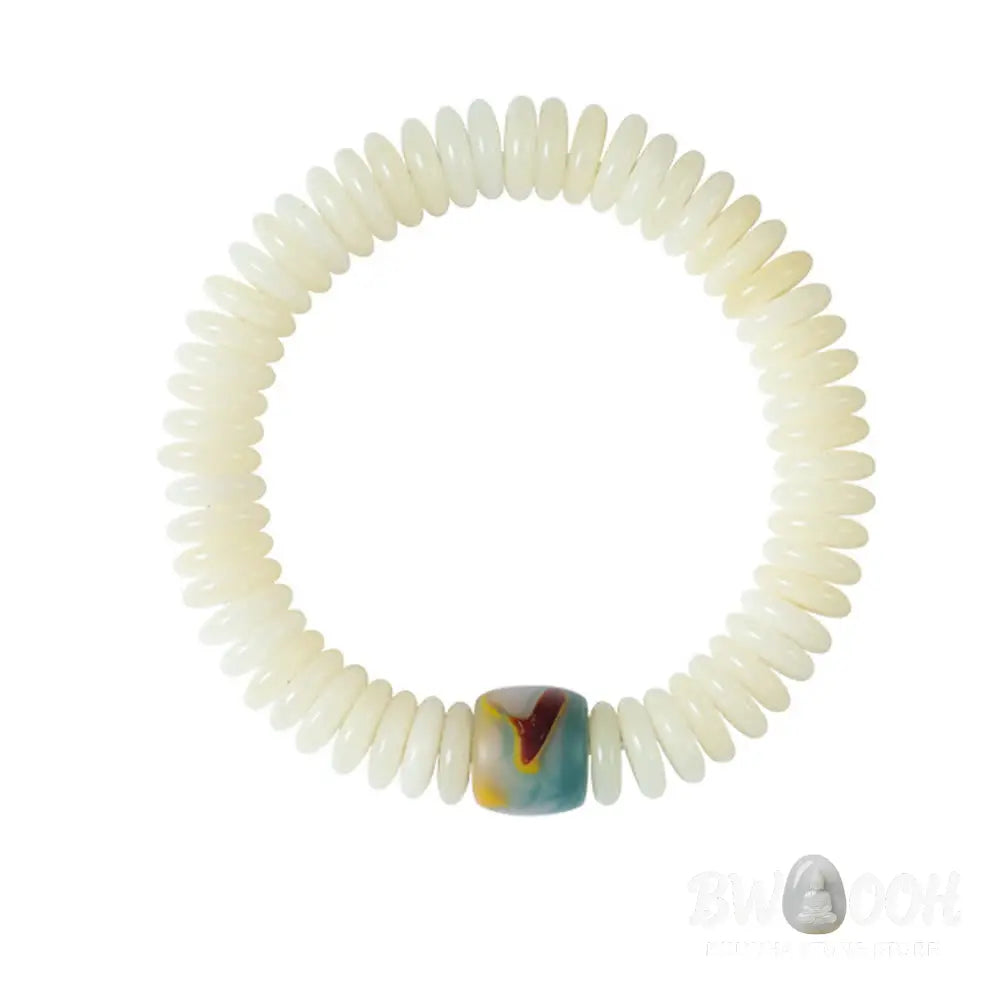 BWOOOH Natural White Bodhi Seed Wisdom Tassel Wrist Mala Bracelet, featuring dark-speckled Bodhi seeds (3x10mm) with a white copper accent and soft tassel, on a 14-15cm elastic string. Ideal for meditation and spiritual balance. - View 8