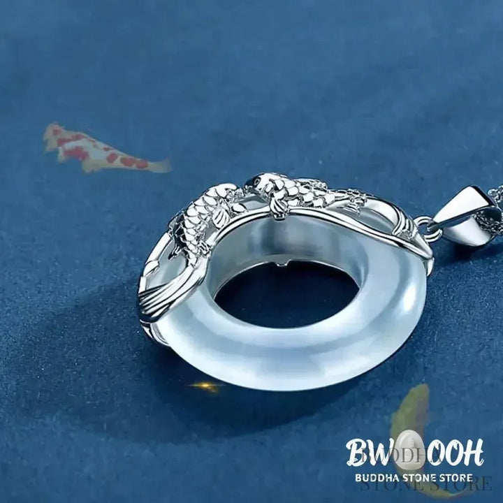 BWOOOH Natural White Jade Koi Lucky Necklace, featuring a polished 22x22mm white jade pendant intricately carved with two koi fish, suspended on a 40cm copper chain. Represents protection, happiness, and wealth. - View 4