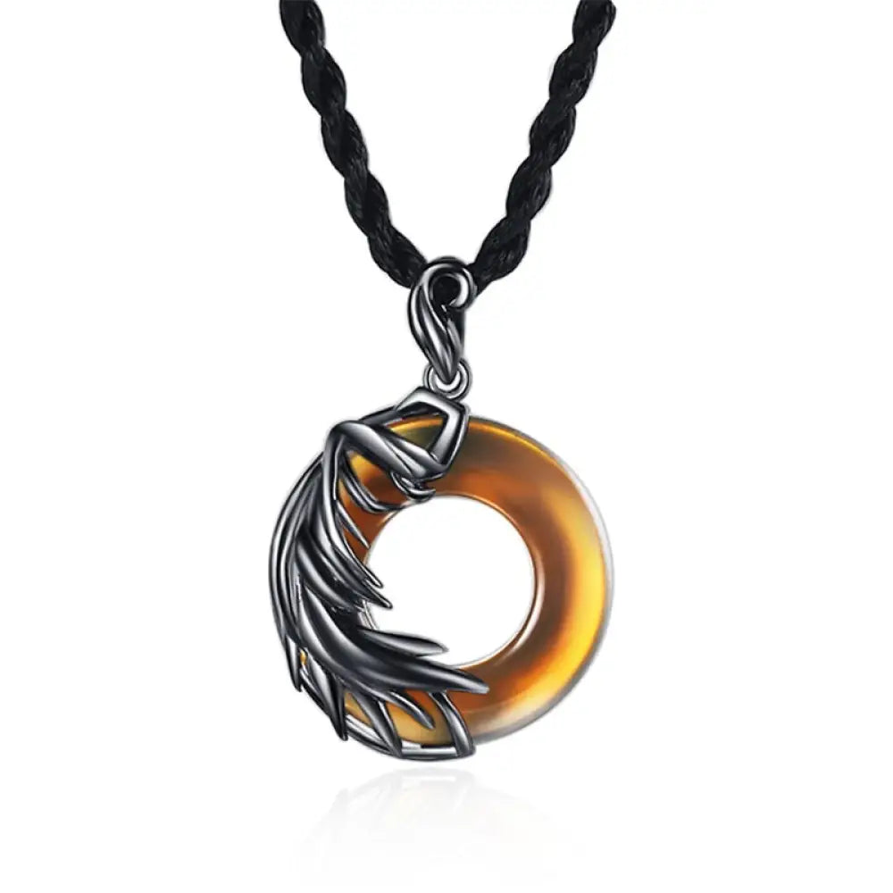 A BWOOOH Obsidian Chalcedony Meditation Round Pendant Necklace, 45cm length, featuring polished black obsidian and serene chalcedony, strung on a subtle copper chain, glowing under soft light. - View 3