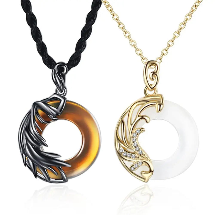 A BWOOOH Obsidian Chalcedony Meditation Round Pendant Necklace, 45cm length, featuring polished black obsidian and serene chalcedony, strung on a subtle copper chain, glowing under soft light.
