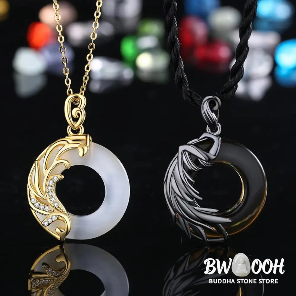 A BWOOOH Obsidian Chalcedony Meditation Round Pendant Necklace, 45cm length, featuring polished black obsidian and serene chalcedony, strung on a subtle copper chain, glowing under soft light. - View 5