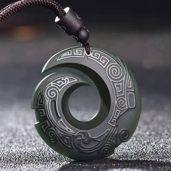 A BWOOOH Hetian Cyan Jade Peace Buckle Luck Necklace Pendant. The smooth, rounded cyan jade features the intricate &
