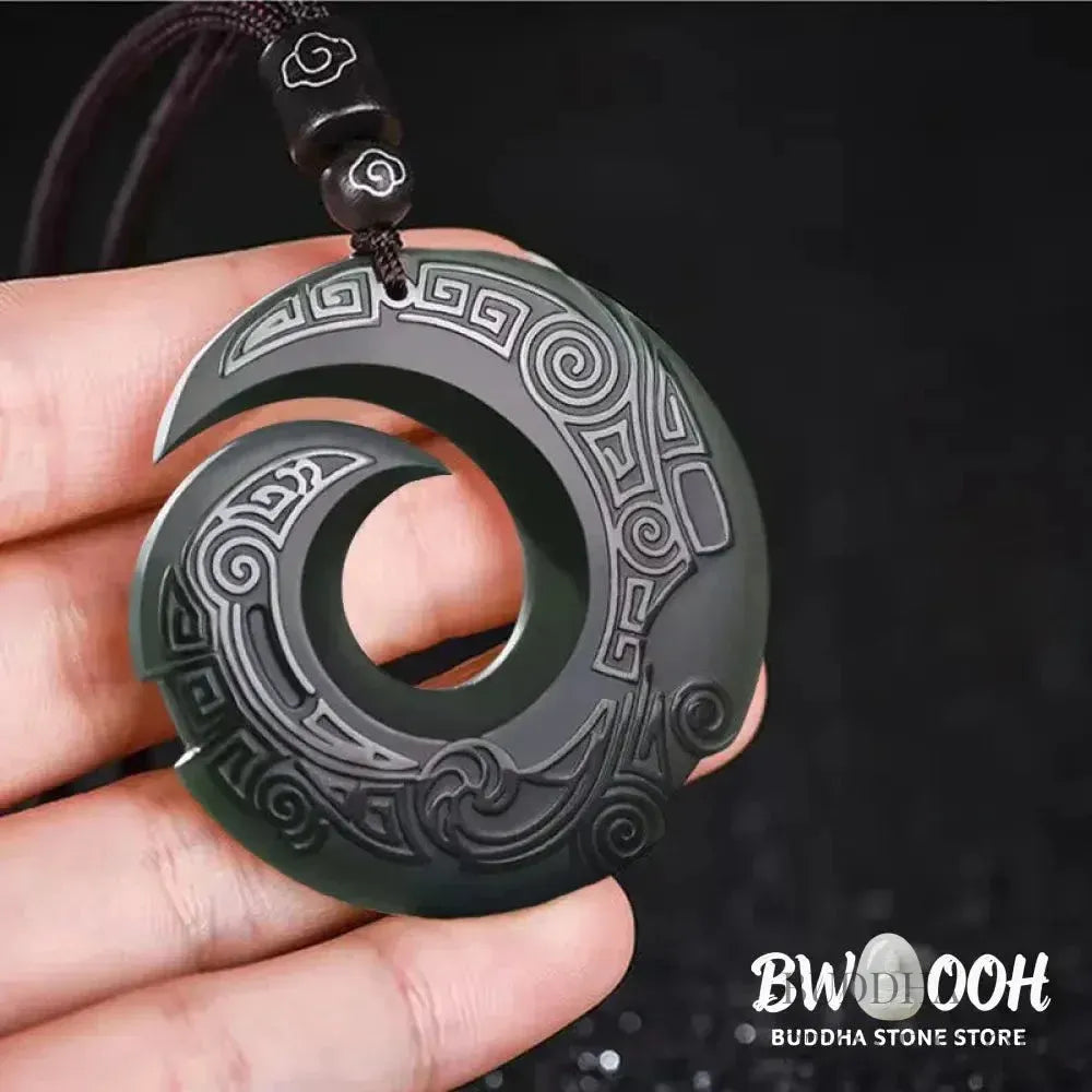 A BWOOOH Hetian Cyan Jade Peace Buckle Luck Necklace Pendant. The smooth, rounded cyan jade features the intricate &