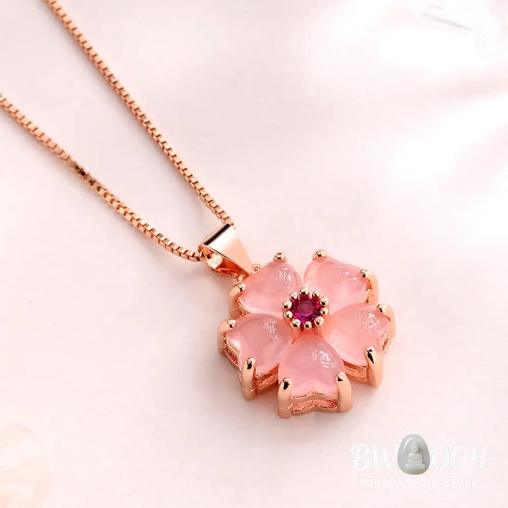 Close-up of a BWOOOH Pink Crystal Love Heart Flower pendant on a copper setting, attached to a delicate 45cm chain, showcasing its soothing warmth and self-love energy. Handcrafted 16x15mm charm. - View 3