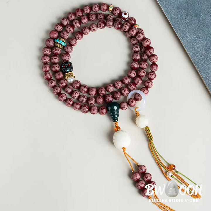 BWOOOH Red Bodhi Seed Harmony Bracelet, 10mm dark-speckled beads. Features engraved Om Mani Padme Hum mantra and Lotus symbol, accented with Liuli Glass, Pearl, Agate, Turquoise beads. Unisex design for spiritual balance and enlightenment. - View 11