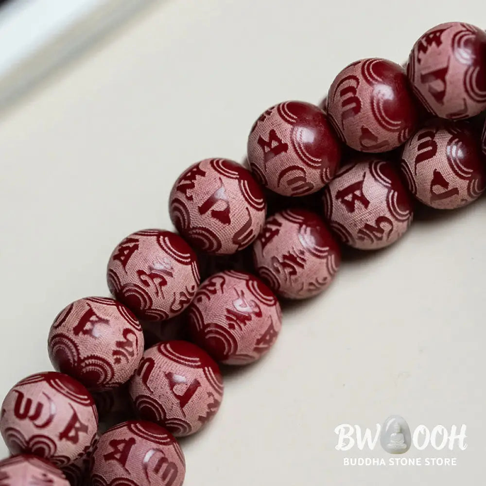 BWOOOH Red Bodhi Seed Harmony Bracelet, 10mm dark-speckled beads. Features engraved Om Mani Padme Hum mantra and Lotus symbol, accented with Liuli Glass, Pearl, Agate, Turquoise beads. Unisex design for spiritual balance and enlightenment. - View 3