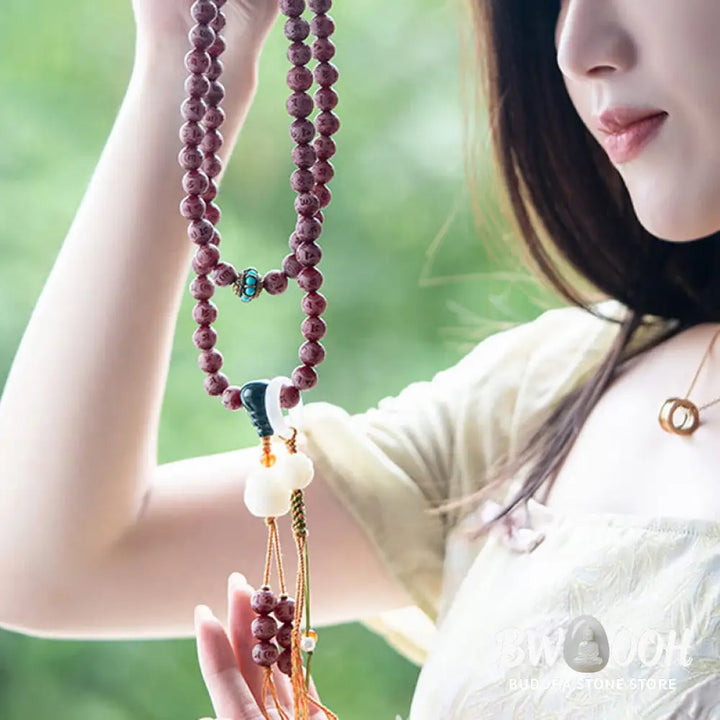 BWOOOH Red Bodhi Seed Harmony Bracelet, 10mm dark-speckled beads. Features engraved Om Mani Padme Hum mantra and Lotus symbol, accented with Liuli Glass, Pearl, Agate, Turquoise beads. Unisex design for spiritual balance and enlightenment. - View 10