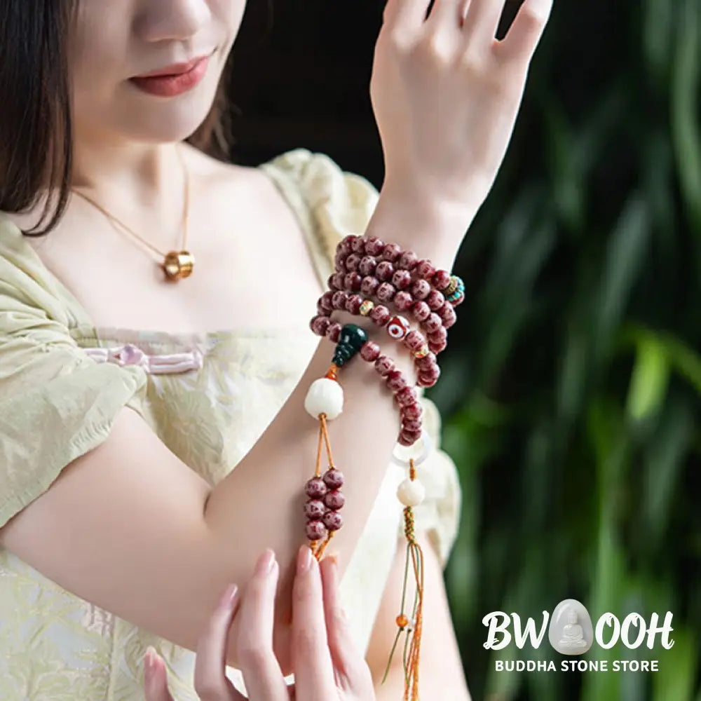 BWOOOH Red Bodhi Seed Harmony Bracelet, 10mm dark-speckled beads. Features engraved Om Mani Padme Hum mantra and Lotus symbol, accented with Liuli Glass, Pearl, Agate, Turquoise beads. Unisex design for spiritual balance and enlightenment. - View 13