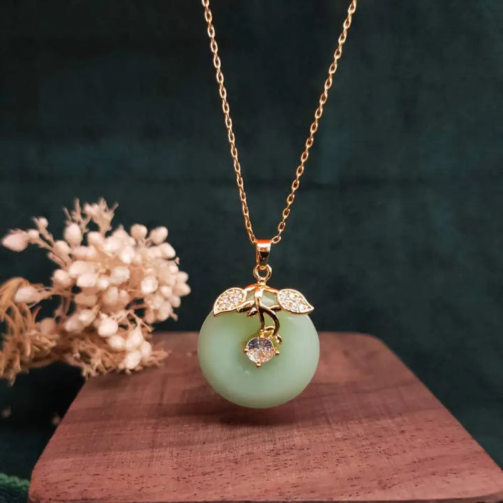 BWOOOH Round Jade Leaf Blessing Fortune Necklace Chain Pendant — natural jade round disc with leaf motif