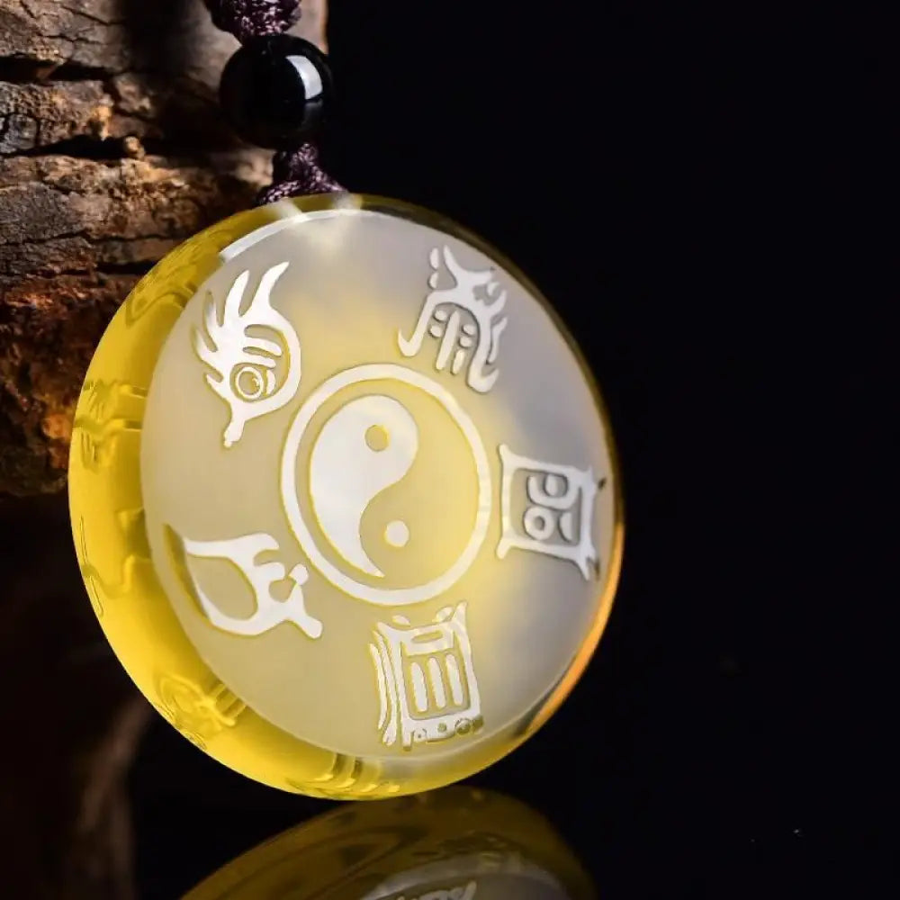 BWOOOH handcrafted Liuli Taoism Five Sacred Mountains Yin Yang symbol balance pendant, featuring Nine Hand Seals, suitable as a necklace or key chain, showcasing ancient Chinese crystal art. - View 9
