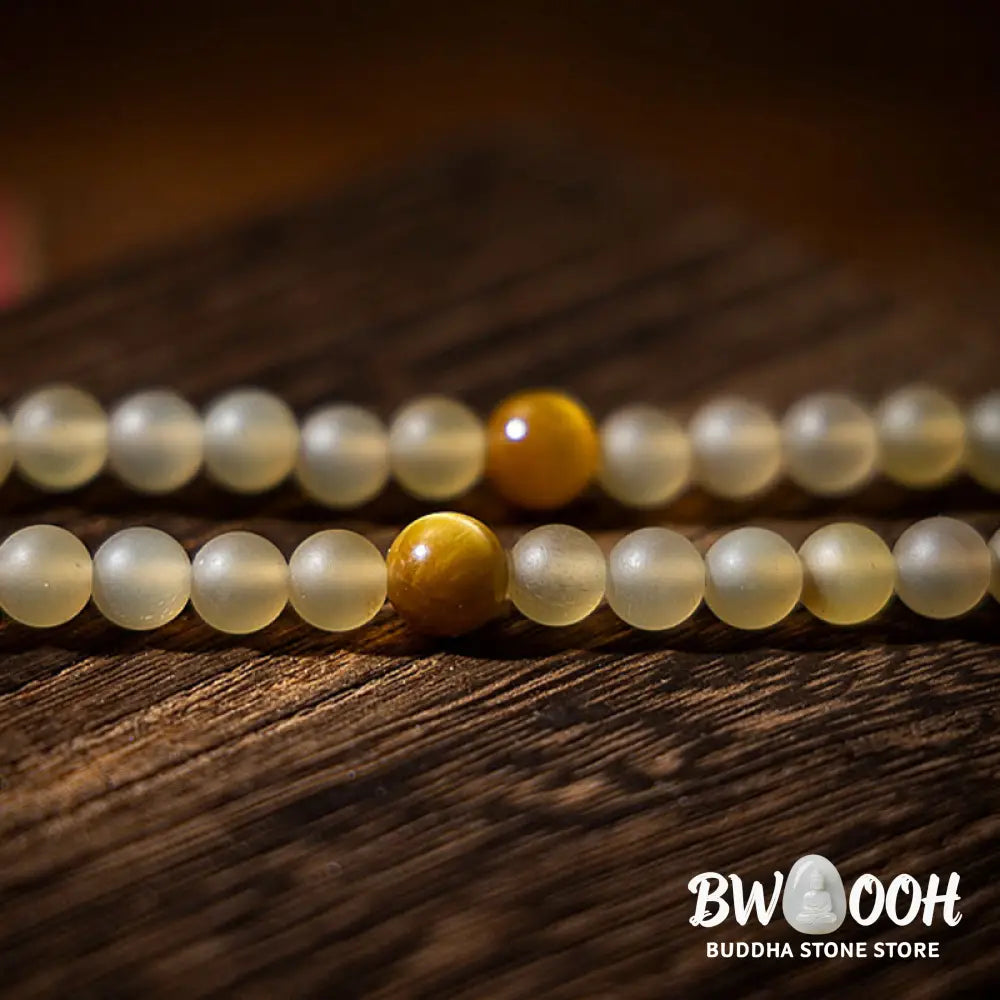 BWOOOH Tibet 108 Mala Beads bracelet featuring natural sheep horn, tiger eye, and Hetian jade with a silver Chinese Zodiac Natal Buddha charm. Sacred amulet for meditation, wealth, protection, and spiritual guidance against negative energy. Elastic string, unisex, 14-16cm wrist. - View 19
