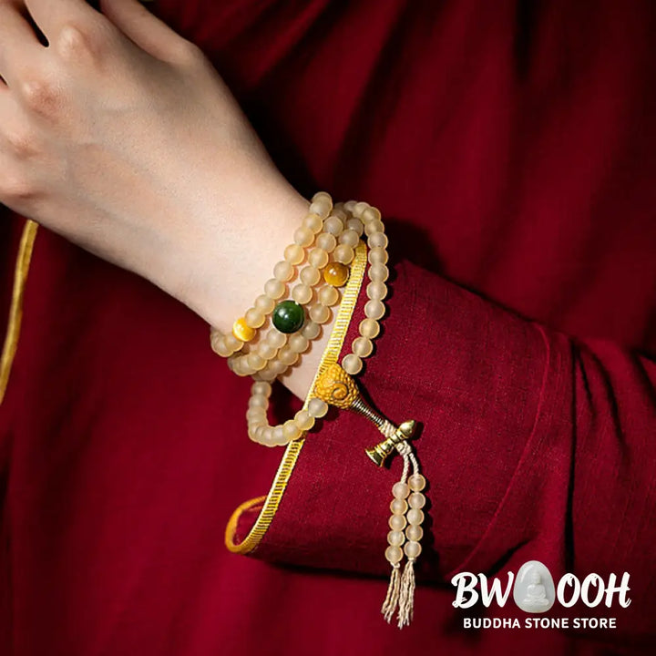 BWOOOH Tibet 108 Mala Beads bracelet featuring natural sheep horn, tiger eye, and Hetian jade with a silver Chinese Zodiac Natal Buddha charm. Sacred amulet for meditation, wealth, protection, and spiritual guidance against negative energy. Elastic string, unisex, 14-16cm wrist. - View 20