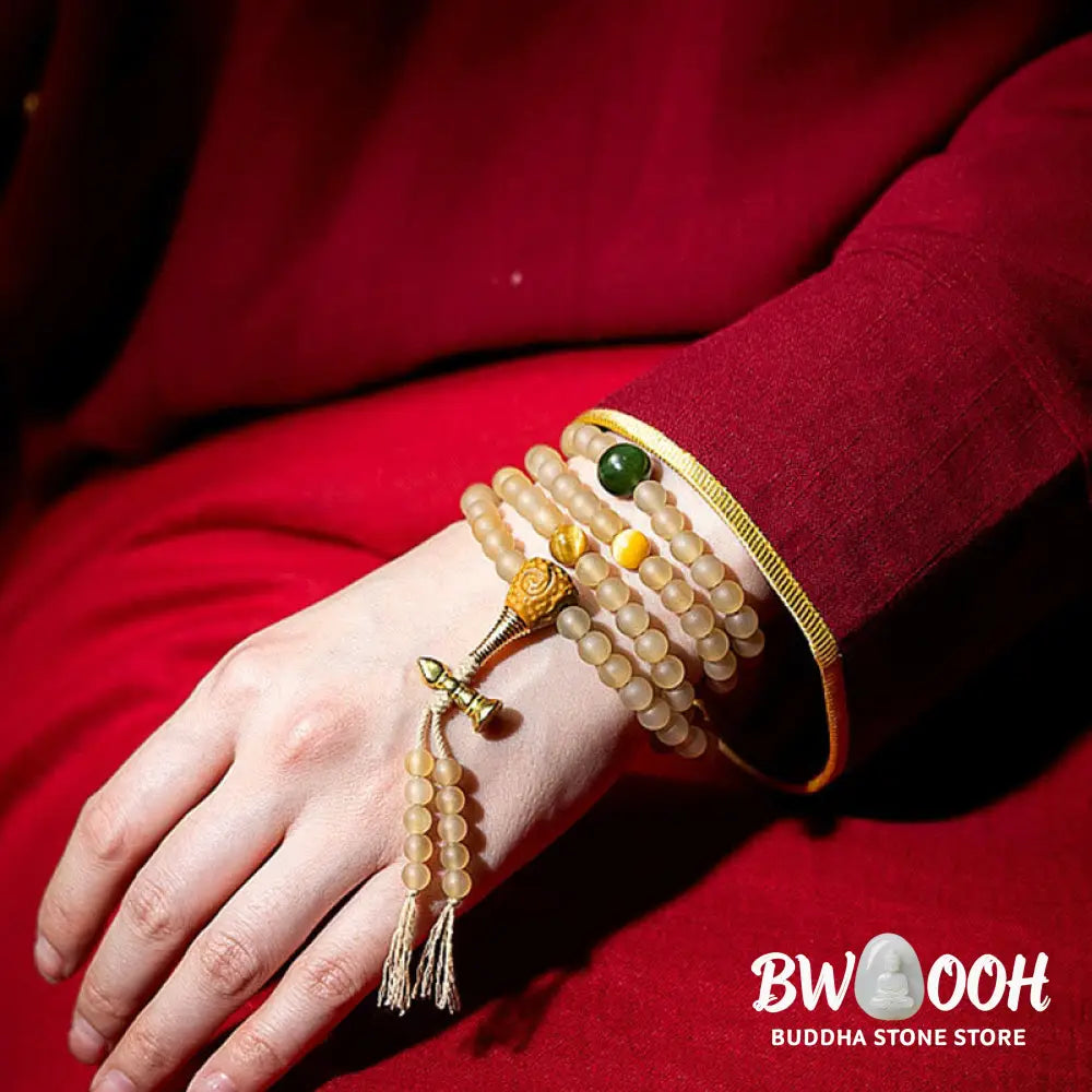 BWOOOH Tibet 108 Mala Beads bracelet featuring natural sheep horn, tiger eye, and Hetian jade with a silver Chinese Zodiac Natal Buddha charm. Sacred amulet for meditation, wealth, protection, and spiritual guidance against negative energy. Elastic string, unisex, 14-16cm wrist. - View 3