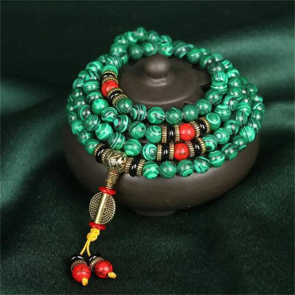 BWOOOH Tibetan 108 Mala crafted from 8MM natural Malachite beads. This versatile handmade bracelet-necklace offers spiritual protection, aids anxiety release, and promotes inner peace. - View 2