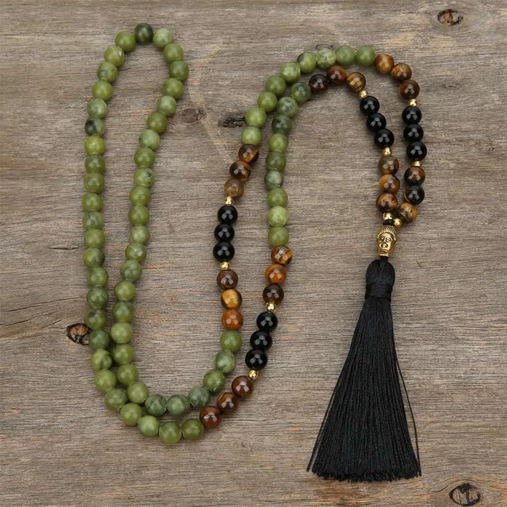 BWOOOH Tibetan Green Jasper Protection Mala Bracelet, featuring 108 polished 8mm beads of Black Onyx, vibrant Green Jasper, and luminous Tiger Eye. A sacred amulet designed for spiritual protection, grounding, and balance, enhancing meditation and daily mindfulness. Subtle copper accents visible.