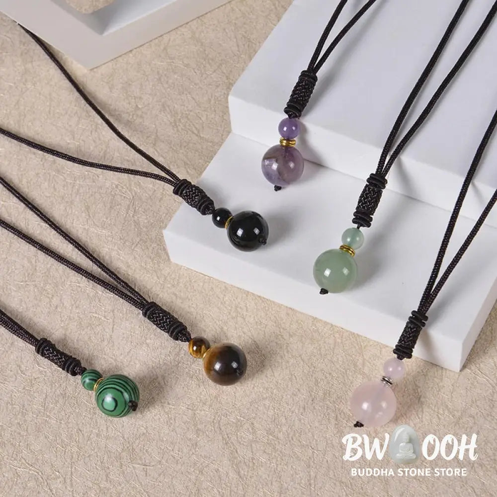 A BWOOOH Tibetan Jade Harmony Necklace, 70cm in length, featuring polished 8mm and 16mm beads of Tiger Eye, Obsidian, Amethyst, Pink Crystal, Jade, and Malachite, designed for spiritual protection and inner peace. - View 16