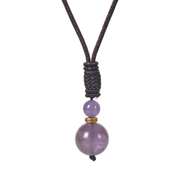 A BWOOOH Tibetan Jade Harmony Necklace, 70cm in length, featuring polished 8mm and 16mm beads of Tiger Eye, Obsidian, Amethyst, Pink Crystal, Jade, and Malachite, designed for spiritual protection and inner peace. - View 6