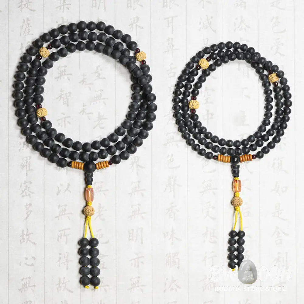BWOOOH authentic Tibetan Mala bracelet or necklace crafted with 108 polished Cypress beads, distinctive dark-speckled Bodhi Seeds, vibrant Red Agate, and deep Garnet accents, embodying spiritual protection and healing energy. - View 13