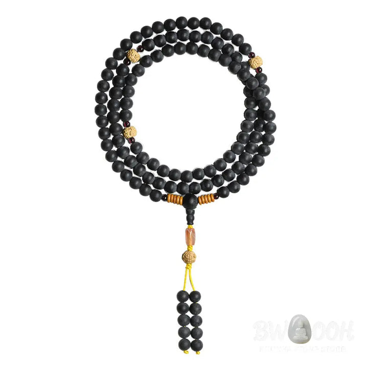 BWOOOH authentic Tibetan Mala bracelet or necklace crafted with 108 polished Cypress beads, distinctive dark-speckled Bodhi Seeds, vibrant Red Agate, and deep Garnet accents, embodying spiritual protection and healing energy. - View 12