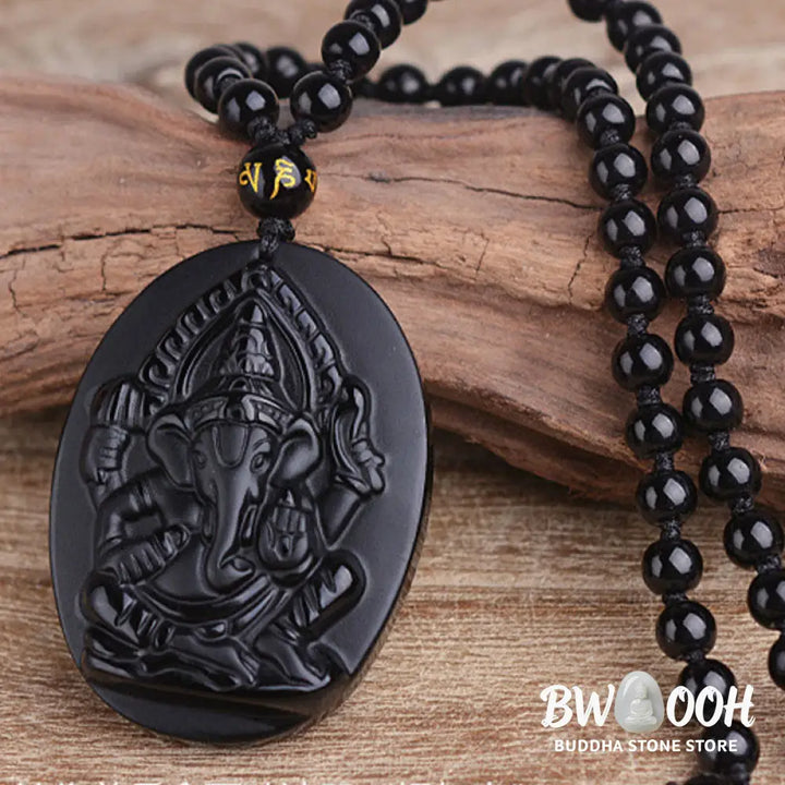 BWOOOH Tibetan Obsidian Ganesh Amulet Necklace, 56cm. Hand-carved elephant Ganesh on natural obsidian, for spiritual protection, prosperity, and root chakra grounding. - View 3