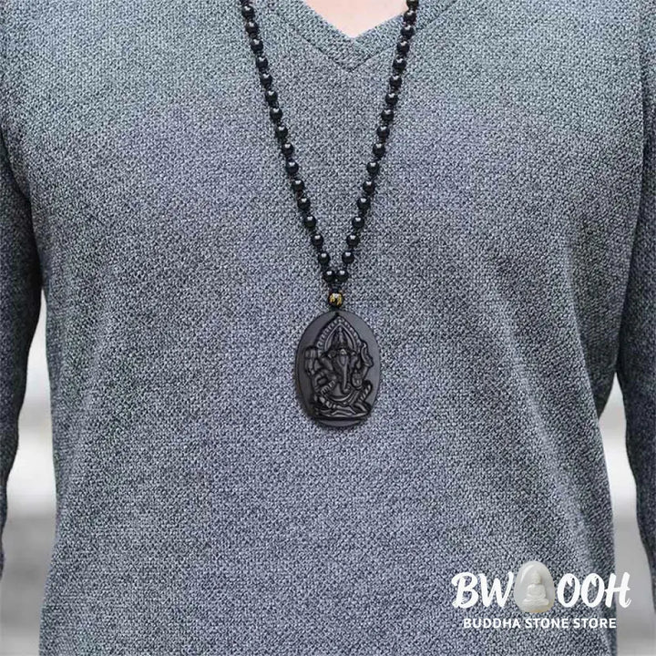 BWOOOH Tibetan Obsidian Ganesh Amulet Necklace, 56cm. Hand-carved elephant Ganesh on natural obsidian, for spiritual protection, prosperity, and root chakra grounding. - View 7