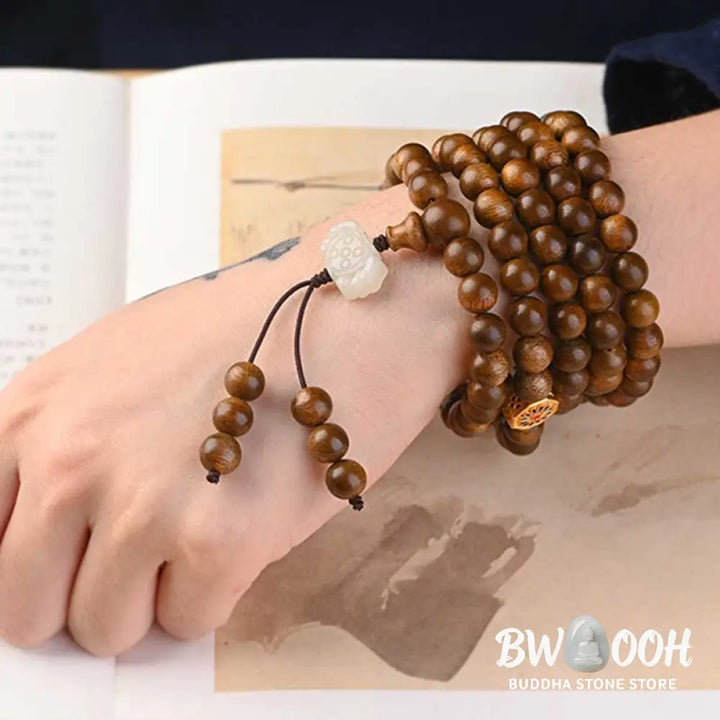 BWOOOH Tibetan Rosewood Protection Calm Bracelet Mala, 108 polished rosewood beads (6mm or 8mm) with red agate, green aventurine, turquoise, and jade accents, evoking protection and calm inspired by ancient Dzi traditions. - View 15