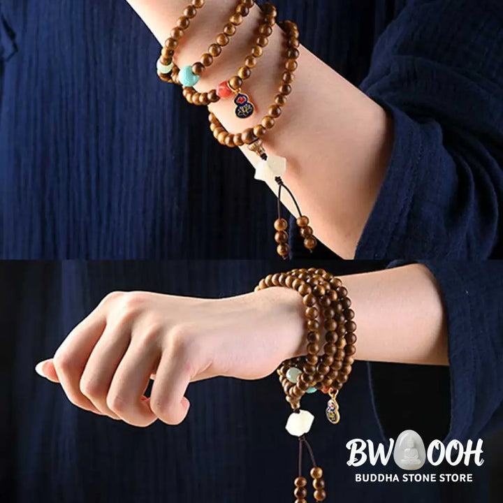 BWOOOH Tibetan Rosewood Protection Calm Bracelet Mala, 108 polished rosewood beads (6mm or 8mm) with red agate, green aventurine, turquoise, and jade accents, evoking protection and calm inspired by ancient Dzi traditions. - View 21
