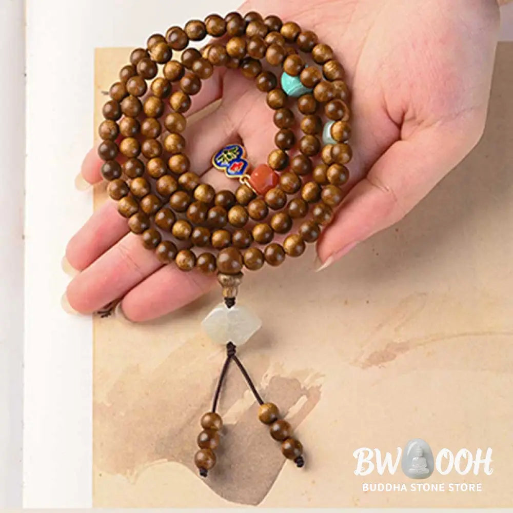 BWOOOH Tibetan Rosewood Protection Calm Bracelet Mala, 108 polished rosewood beads (6mm or 8mm) with red agate, green aventurine, turquoise, and jade accents, evoking protection and calm inspired by ancient Dzi traditions. - View 16