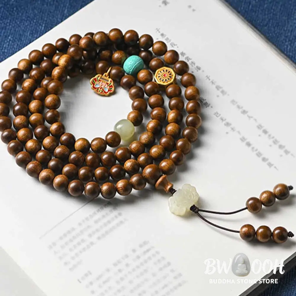 BWOOOH Tibetan Rosewood Protection Calm Bracelet Mala, 108 polished rosewood beads (6mm or 8mm) with red agate, green aventurine, turquoise, and jade accents, evoking protection and calm inspired by ancient Dzi traditions. - View 3
