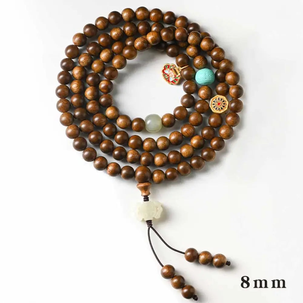 BWOOOH Tibetan Rosewood Protection Calm Bracelet Mala, 108 polished rosewood beads (6mm or 8mm) with red agate, green aventurine, turquoise, and jade accents, evoking protection and calm inspired by ancient Dzi traditions. - View 9