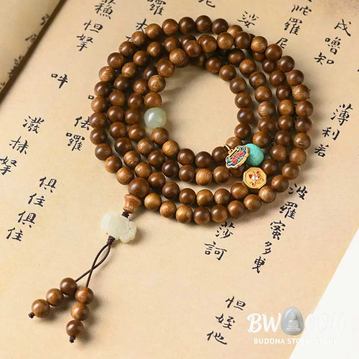 BWOOOH Tibetan Rosewood Protection Calm Bracelet Mala, 108 polished rosewood beads (6mm or 8mm) with red agate, green aventurine, turquoise, and jade accents, evoking protection and calm inspired by ancient Dzi traditions. - View 2