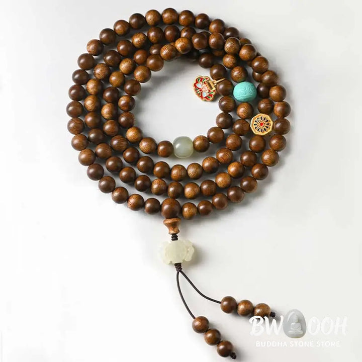 BWOOOH Tibetan Rosewood Protection Calm Bracelet Mala, 108 polished rosewood beads (6mm or 8mm) with red agate, green aventurine, turquoise, and jade accents, evoking protection and calm inspired by ancient Dzi traditions. - View 12