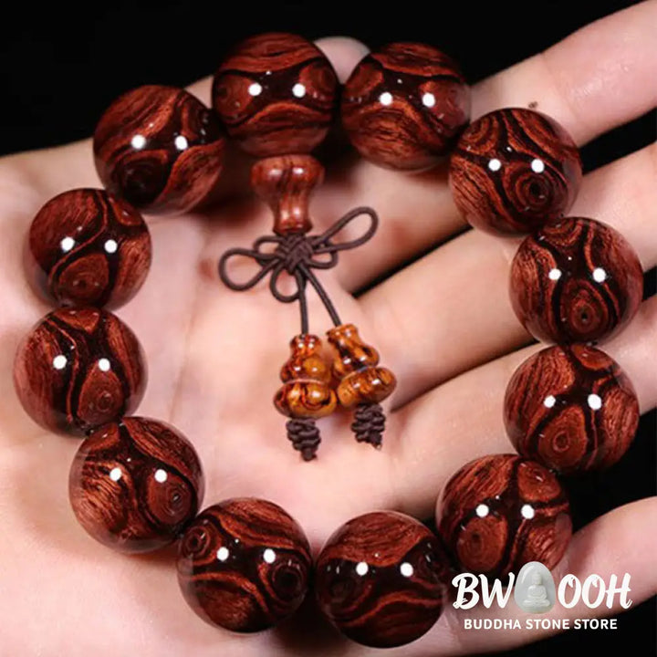 BWOOOH Tibetan Rosewood Warmth Bracelet in a close-up, showcasing either round block or Chinese knotting, with various bead sizes (6mm-30mm), handcrafted for meditation and spiritual protection. - View 5