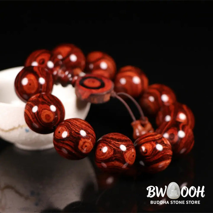 BWOOOH Tibetan Rosewood Warmth Bracelet in a close-up, showcasing either round block or Chinese knotting, with various bead sizes (6mm-30mm), handcrafted for meditation and spiritual protection. - View 2