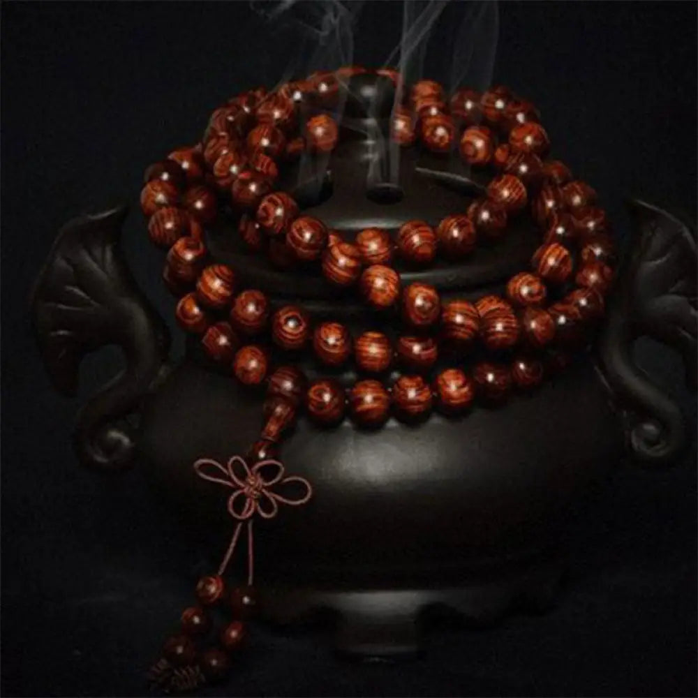 BWOOOH Tibetan Rosewood Warmth Bracelet in a close-up, showcasing either round block or Chinese knotting, with various bead sizes (6mm-30mm), handcrafted for meditation and spiritual protection. - View 6