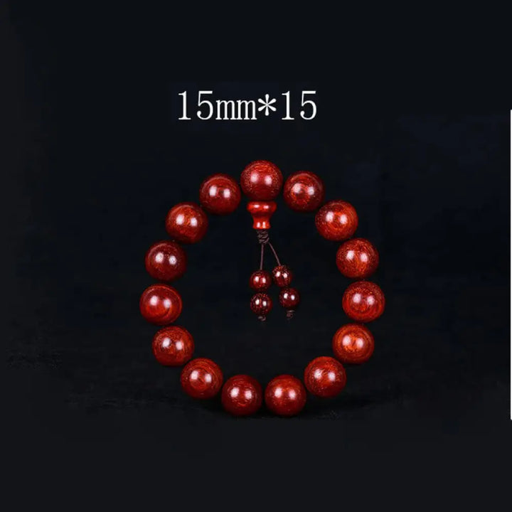 BWOOOH Tibetan Small Leaf Red Sandalwood Balance Bracelet, 108 beads, close-up. Polished dark red wood beads with subtle grain, evoking spiritual protection and calm. - View 9
