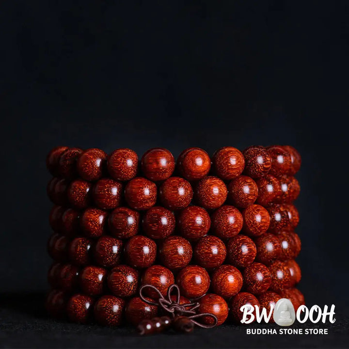 BWOOOH Tibetan Small Leaf Red Sandalwood Balance Bracelet, 108 beads, close-up. Polished dark red wood beads with subtle grain, evoking spiritual protection and calm. - View 14