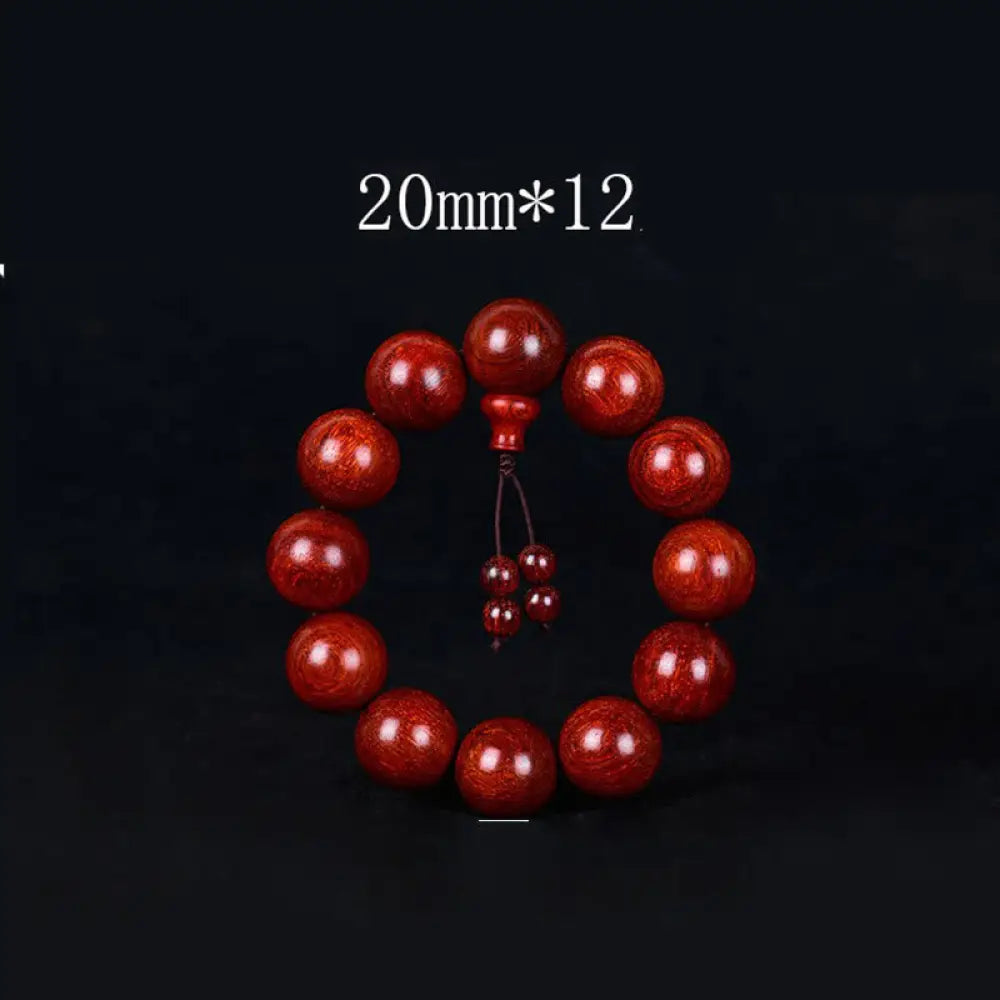 BWOOOH Tibetan Small Leaf Red Sandalwood Balance Bracelet, 108 beads, close-up. Polished dark red wood beads with subtle grain, evoking spiritual protection and calm. - View 11