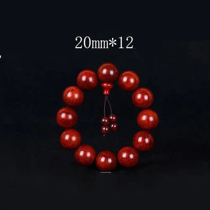 BWOOOH Tibetan Small Leaf Red Sandalwood Balance Bracelet, 108 beads, close-up. Polished dark red wood beads with subtle grain, evoking spiritual protection and calm. - View 11