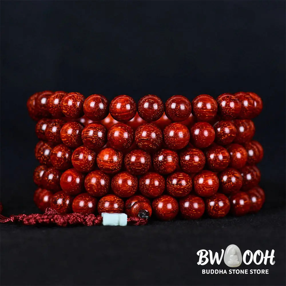 BWOOOH Tibetan Small Leaf Red Sandalwood Balance Bracelet, 108 beads, close-up. Polished dark red wood beads with subtle grain, evoking spiritual protection and calm. - View 15