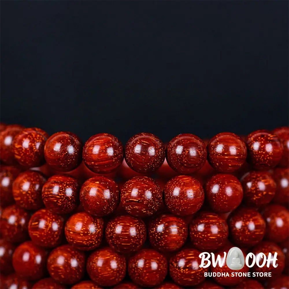 BWOOOH Tibetan Small Leaf Red Sandalwood Balance Bracelet, 108 beads, close-up. Polished dark red wood beads with subtle grain, evoking spiritual protection and calm. - View 16