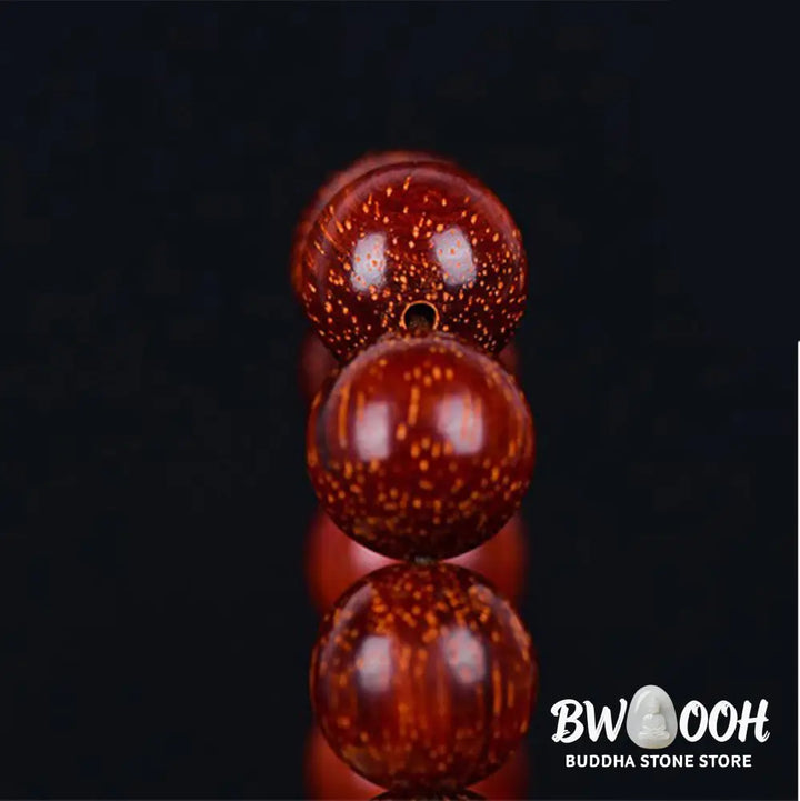 BWOOOH Tibetan Small Leaf Red Sandalwood Balance Bracelet, 108 beads, close-up. Polished dark red wood beads with subtle grain, evoking spiritual protection and calm. - View 17