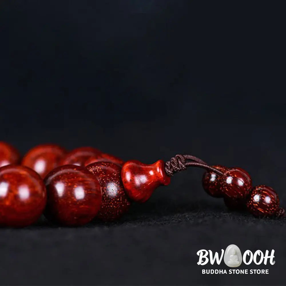 BWOOOH Tibetan Small Leaf Red Sandalwood Balance Bracelet, 108 beads, close-up. Polished dark red wood beads with subtle grain, evoking spiritual protection and calm. - View 18