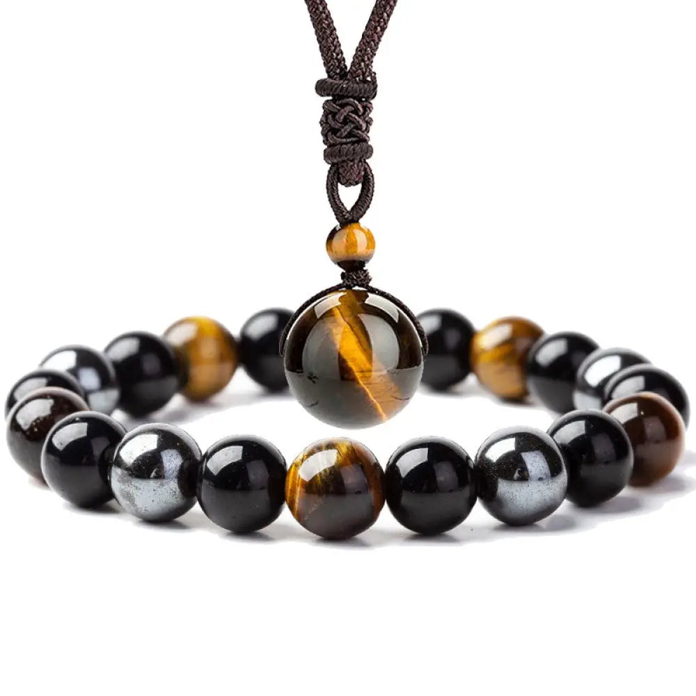 A BWOOOH Tibetan Tiger's Eye Bracelet and Necklace set, featuring rich golden-brown Tiger's Eye, deep black Obsidian, frosted white stones, and vibrant purple Amethyst beads, symbolizing courage and spiritual grounding.