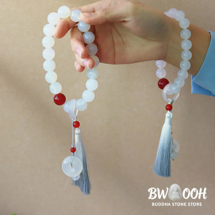 BWOOOH White Agate Red Agate Luck Wrist Mala with tassels, featuring 12mm-14mm beads, for meditation, pocket charm, or car decoration, symbolizing clarity, peace, and confidence. - View 4