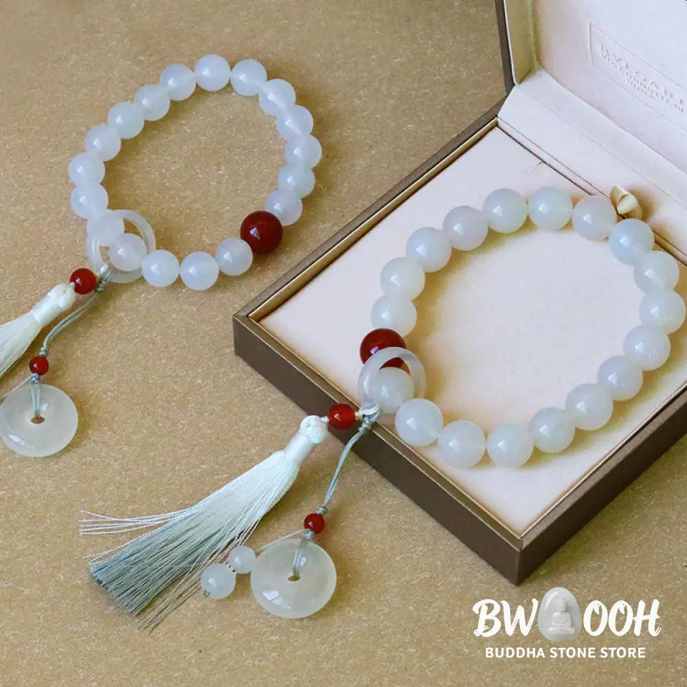 BWOOOH White Agate Red Agate Luck Wrist Mala with tassels, featuring 12mm-14mm beads, for meditation, pocket charm, or car decoration, symbolizing clarity, peace, and confidence. - View 2