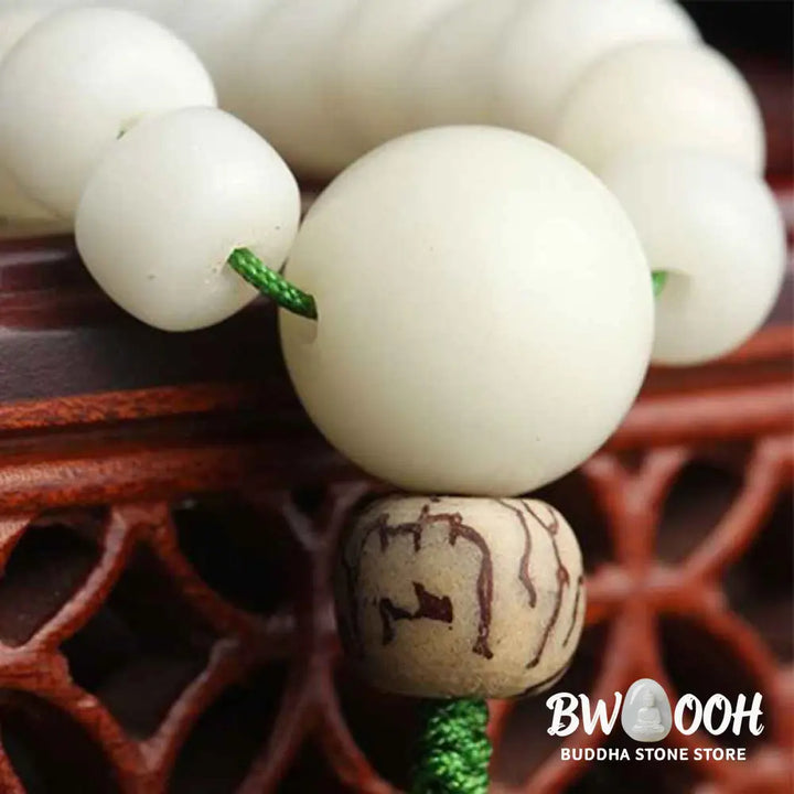 BWOOOH White Jade Bodhi Lotus Mala Harmony Necklace Bracelet with 108 naturally pale Bodhi seeds and a delicate lotus pendant, embodying purity and spiritual awakening for meditation and daily wear. - View 11