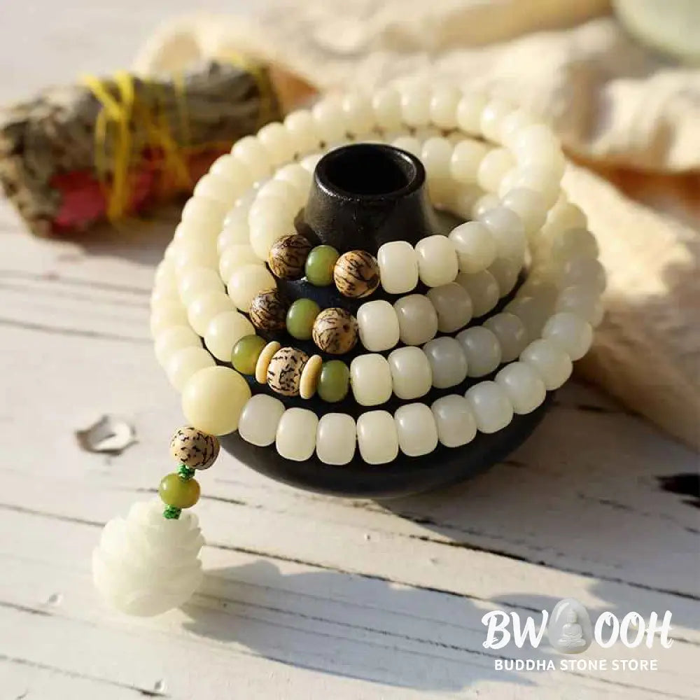 BWOOOH White Jade Bodhi Lotus Mala Harmony Necklace Bracelet with 108 naturally pale Bodhi seeds and a delicate lotus pendant, embodying purity and spiritual awakening for meditation and daily wear. - View 3
