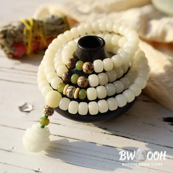 BWOOOH White Jade Bodhi Lotus Mala Harmony Necklace Bracelet with 108 naturally pale Bodhi seeds and a delicate lotus pendant, embodying purity and spiritual awakening for meditation and daily wear. - View 3